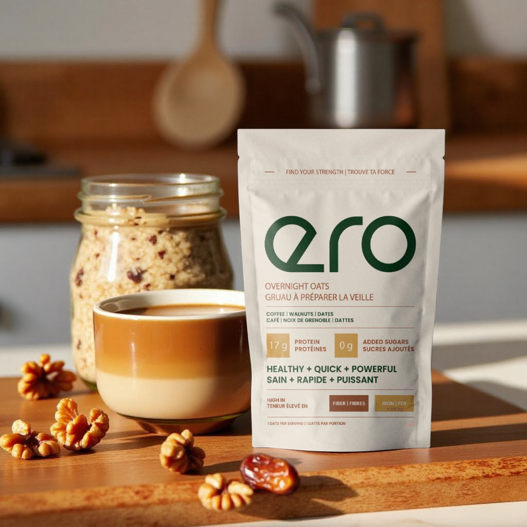 ero Strength Oats packaging displayed with a fresh cup of coffee and organic oat, seed, and nut ingredients arranged on a rustic wooden table.