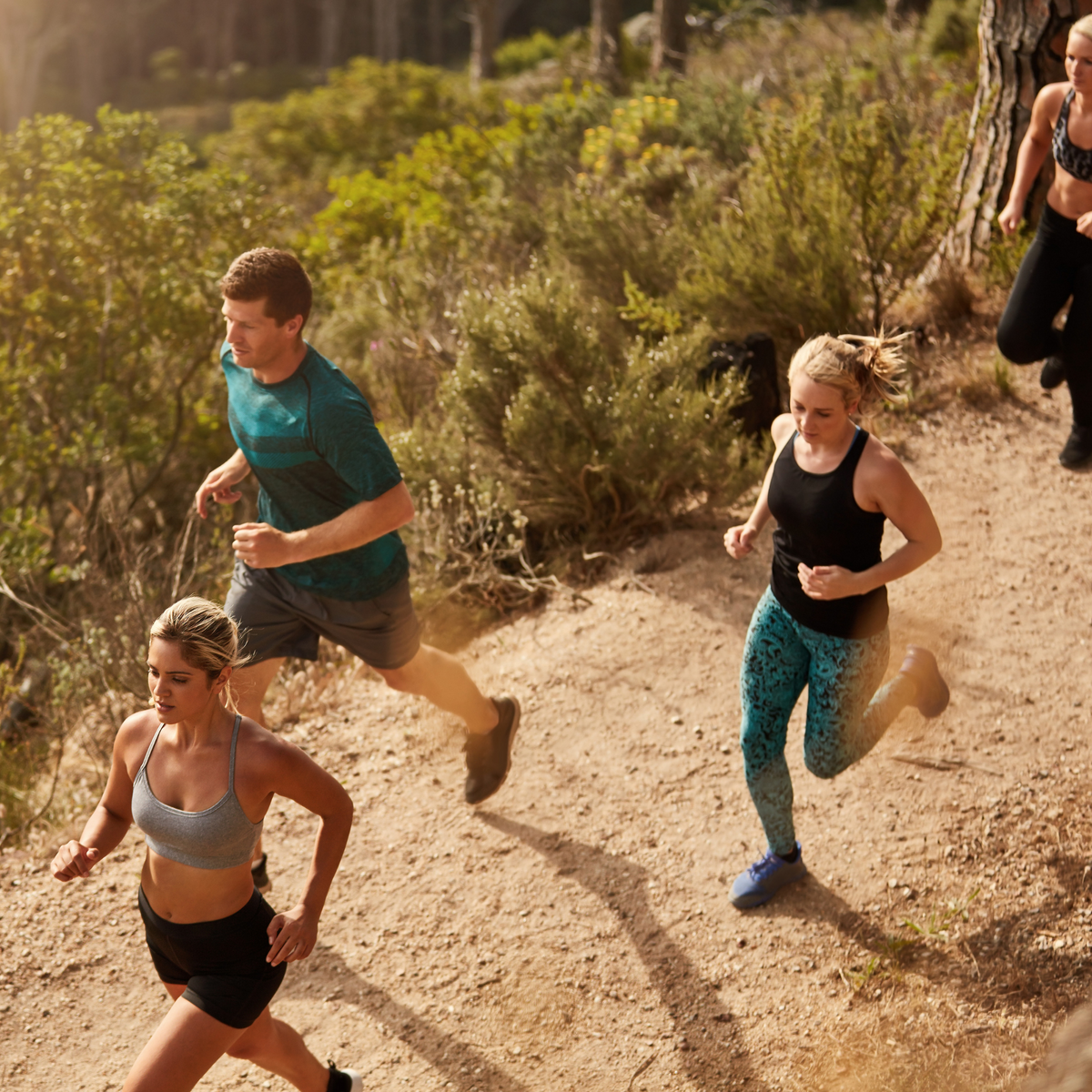 Group of athletes trail running together, representing ero Clubs and Event Partners