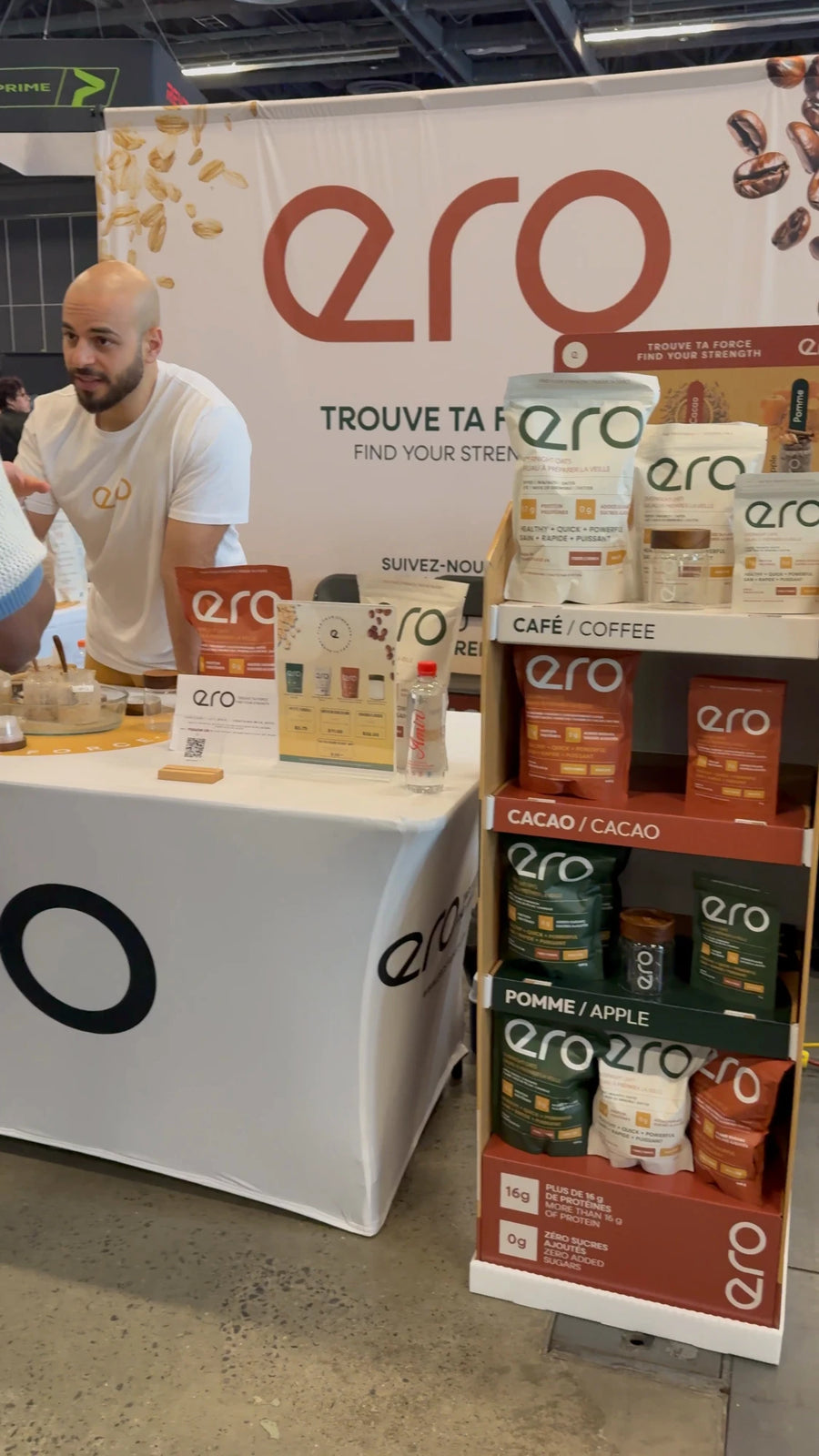 ero brand activation booth at a trade show with product display shelf and team member
