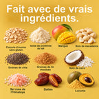 Fait avec de vrais ingrédients : flocons d'avoine sans gluten, isolat de protéines de lait, mangue, noix de macadamia, noix de coco, graines de chia, graines de lin moulues, poudre de lucuma, dattes