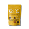 Bright yellow Ero Mango, Macadamia, Coconut & Lucuma Powder overnight oats package on a white background—high-protein, tropical superfood breakfast blend.