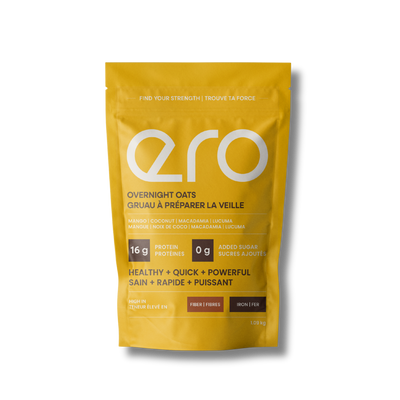 Bright yellow Ero Mango, Macadamia, Coconut & Lucuma Powder overnight oats package on a white background—high-protein, tropical superfood breakfast blend.