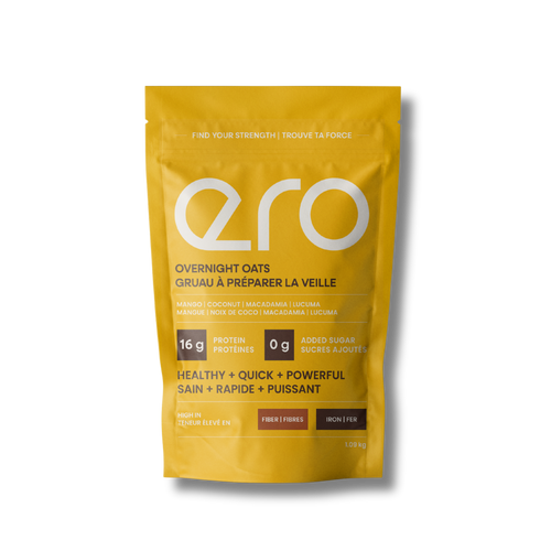 Bright yellow Ero Mango, Macadamia, Coconut & Lucuma Powder overnight oats package on a white background—high-protein, tropical superfood breakfast blend.
