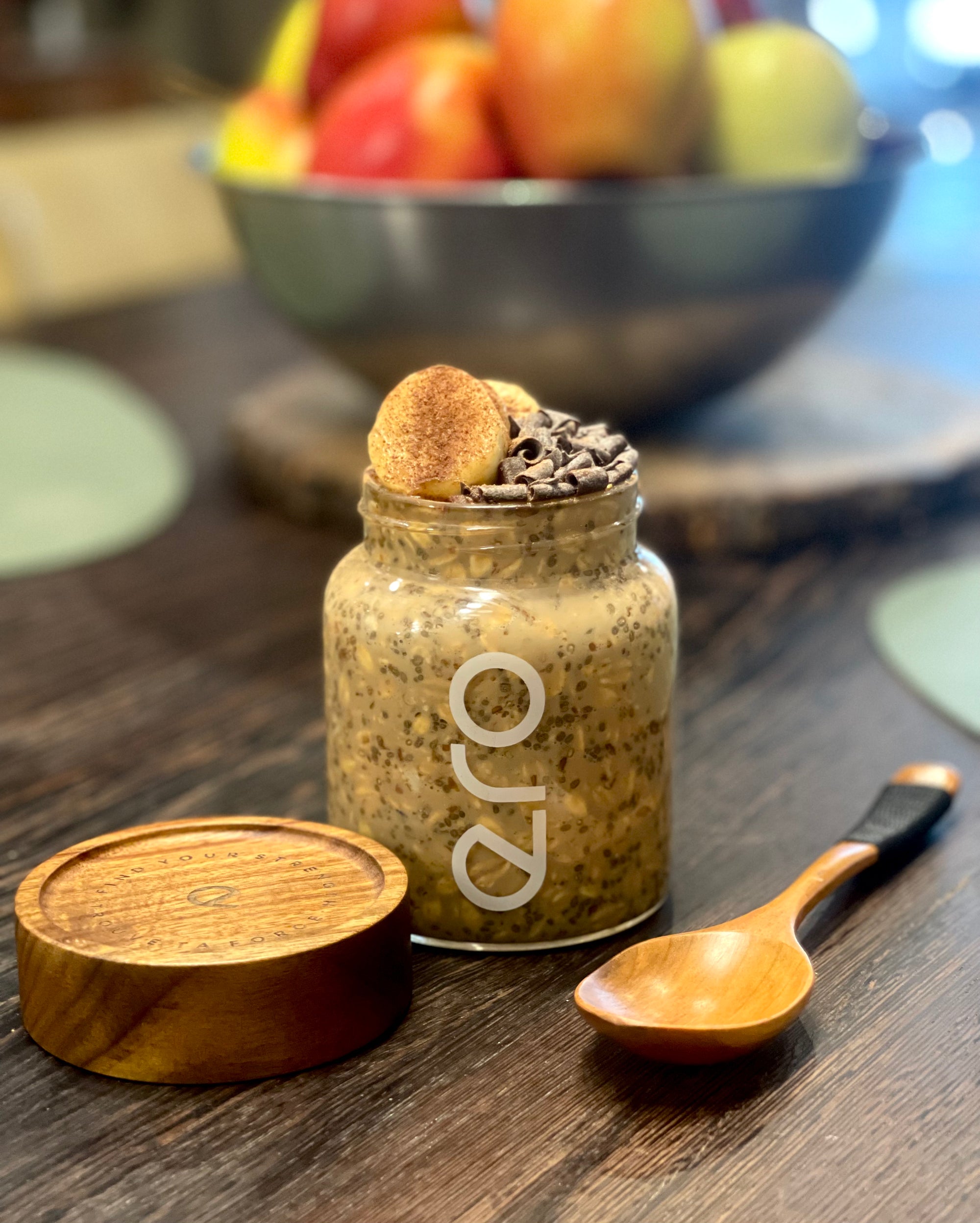 Before and after slider comparing plain oats to ero Strength Oats with protein, nuts, and seeds in a kitchen jar setting